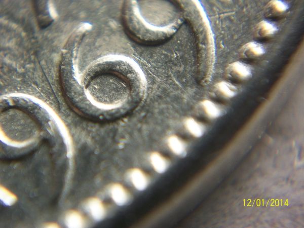 Missing-Letters-Double-Date-1969-Five-Cent